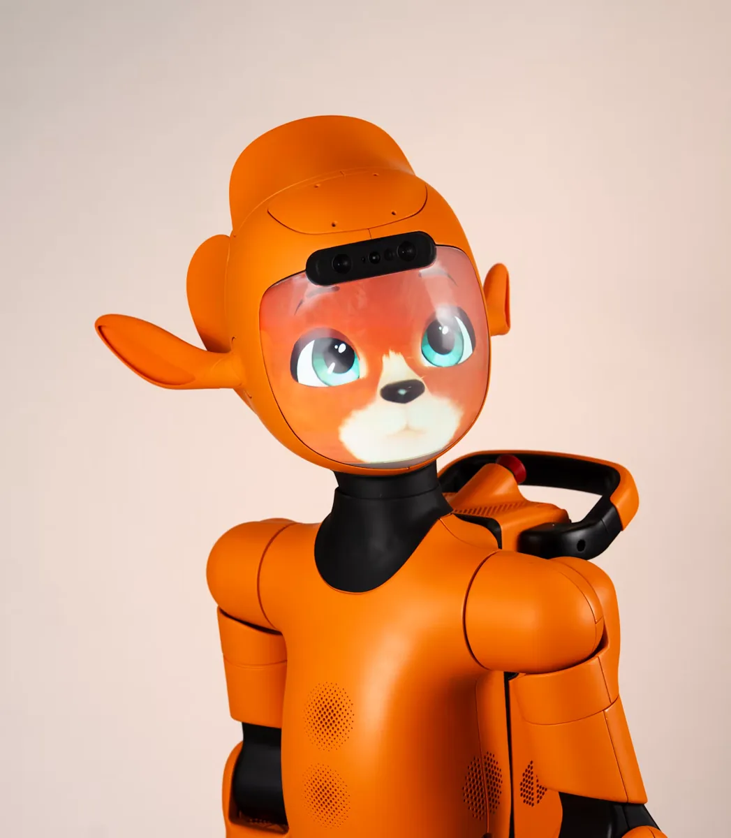 Mirokaï, an orange character robot with an animated face